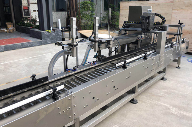 olajtöltő vödör fedőgép.jpg