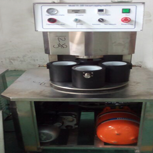 illustration of vacuum capping machine semi automatic illusztráció a vákuumzáráshoz.jpg